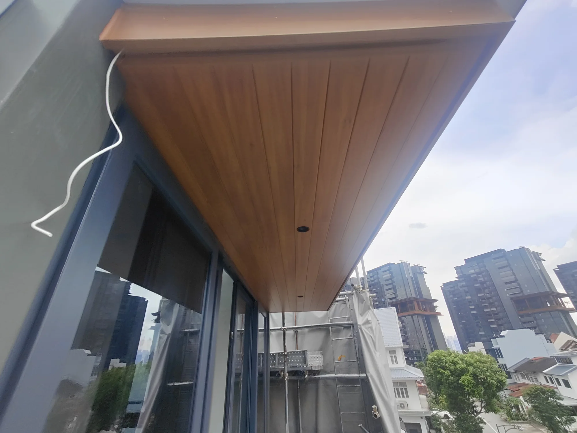 Balcony underside, aluminium composite panel roofing installed by Exterior Design in Singapore