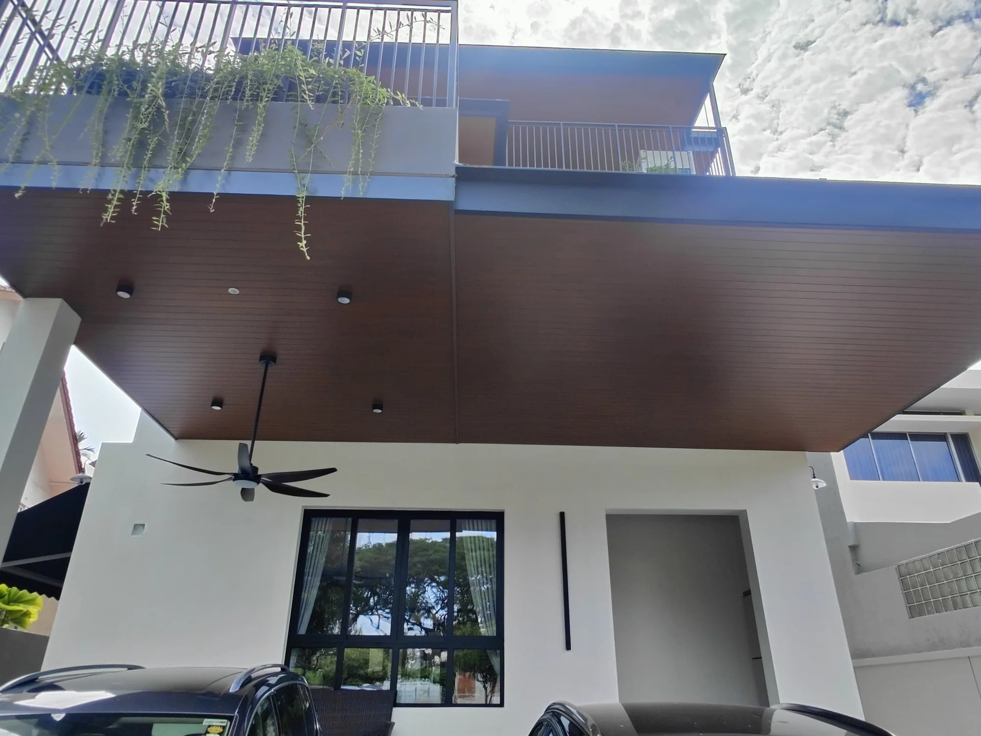 Carport and planter, aluminium composite panel roofing installed by Exterior Design in Singapore