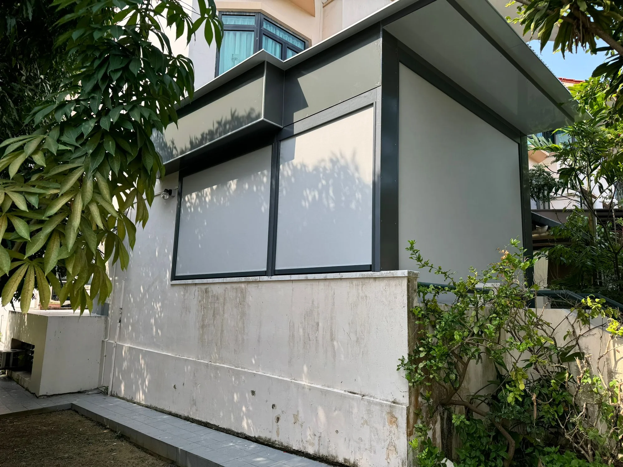 ZipNice zip blinds around a covered lounge, Singapore